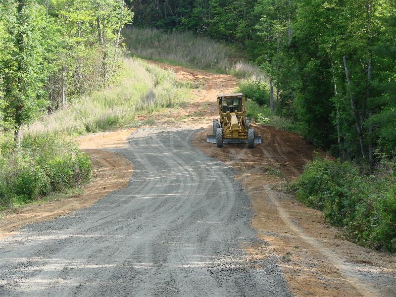 Whitmire Grading is working in Transylvania County on road construction to meet the county subdivision ordinance requirements.