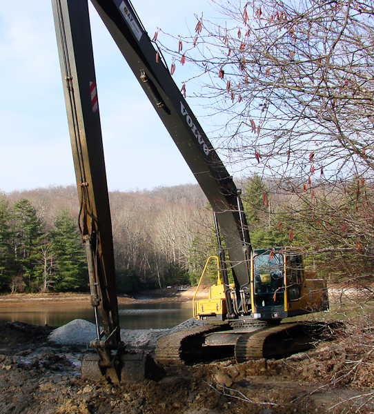 With a 60 foot reach this excavator made a lake desiltation project  near Brevard much easier.