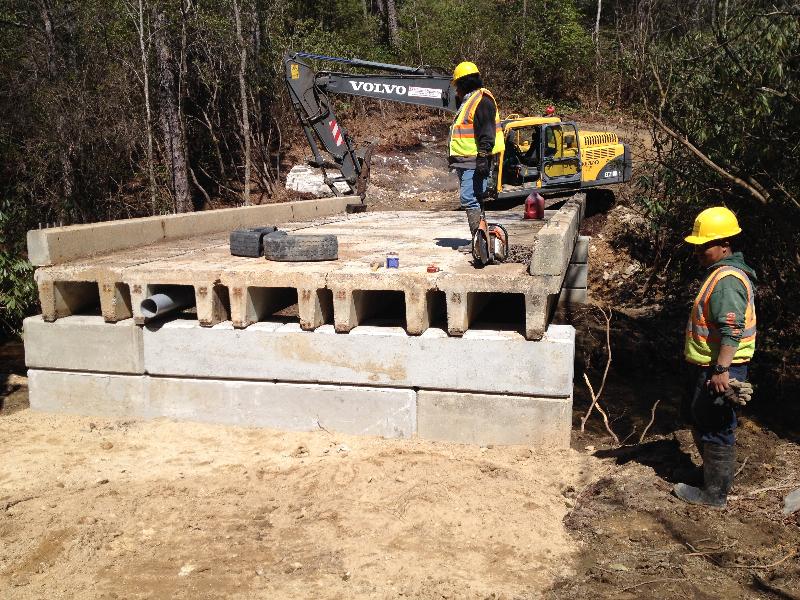 Bode Bridge Set 021 Whitmire Grading constructed this farm bridge out of recycled precast bridge spans.