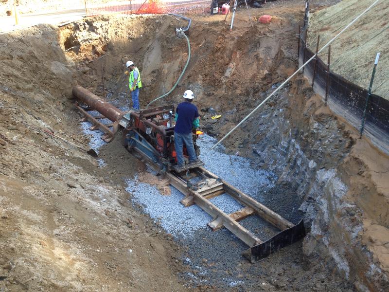 The Department Of Transportation would not allow an open cut to be made across Highway 9 in Lake Lure for the installation of the water main so it had to be bored and jacked.