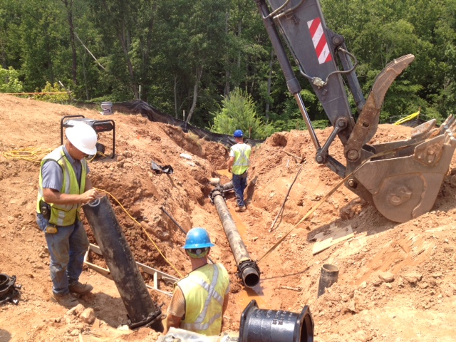 Whitmire Grading provides preparation and installation of water lines and drainage systems.  On this project crews are rerouting an existing  eight inch waterline in Asheville, N.C.   